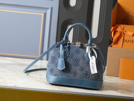LOUIS VUITTON M53152  Embossed Denim Handbag